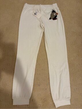 New with tags: Authentic Gucci Girls pants with logo Bird Patch
